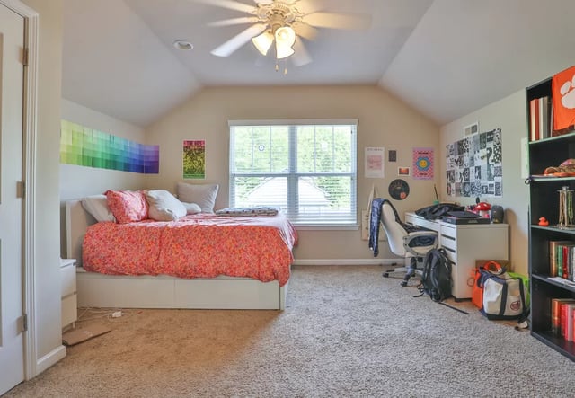 Bed desk chair and bookshelf bedroom at Varsity Club in Clemson Student Accommodation
